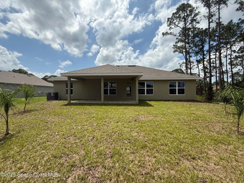 Exterior details and patio area of a home in Palm Bay, Palm Bay (Image 2).