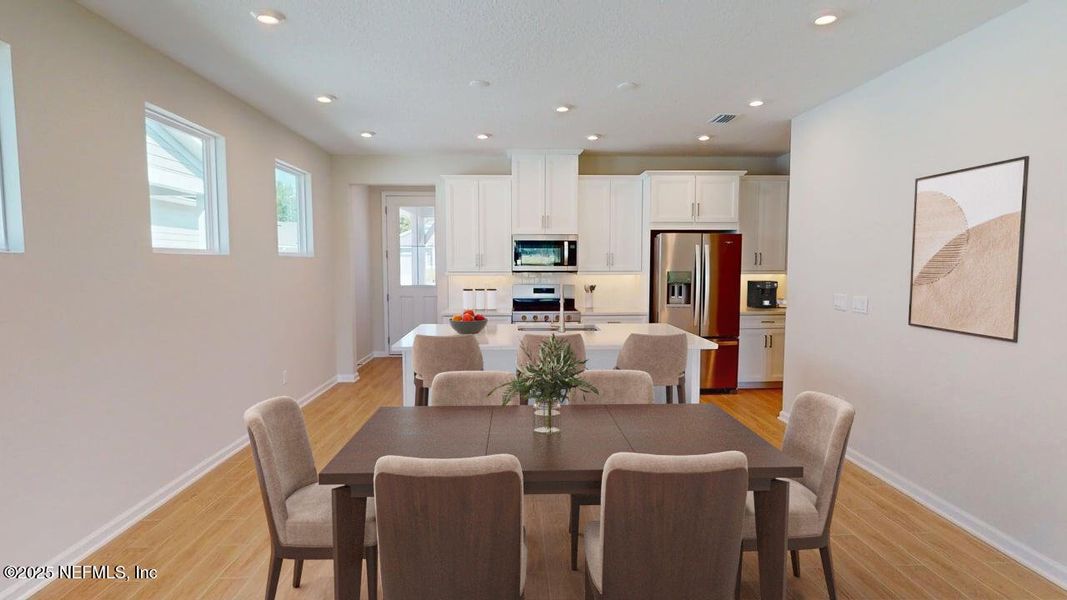 Furnished interior view inside a new home in RiverTown - WaterSong, St. Johns (Image 7).
