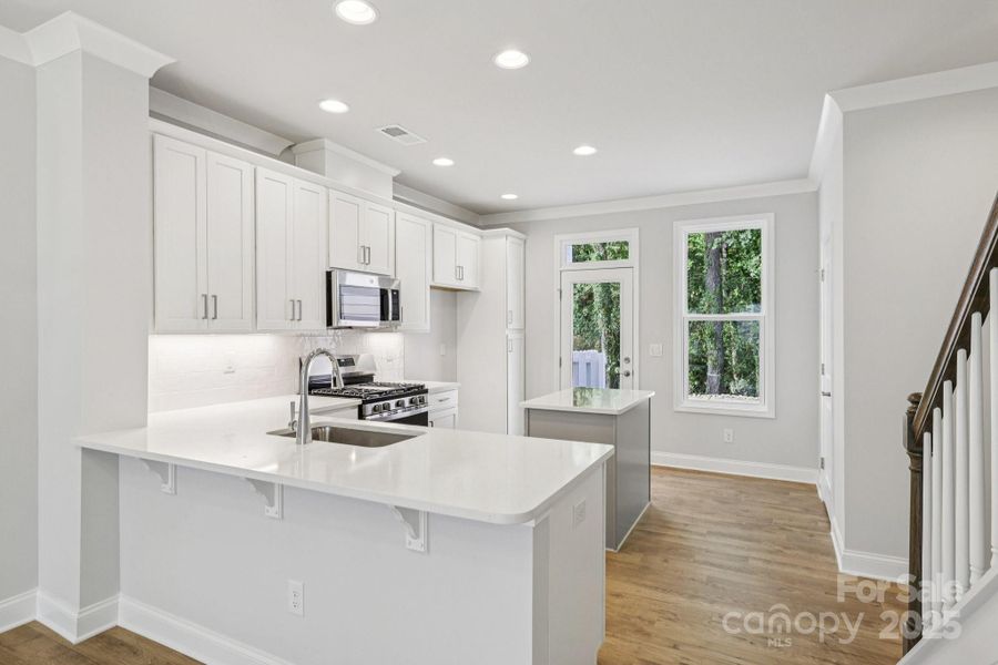 Furnished interior view inside a new home in , Huntersville (Image 3).
