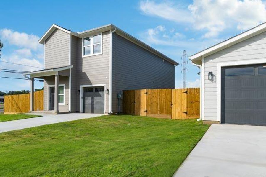 Front exterior of a new home in , Dallas, TX, highlighting curb appeal (Image 16).