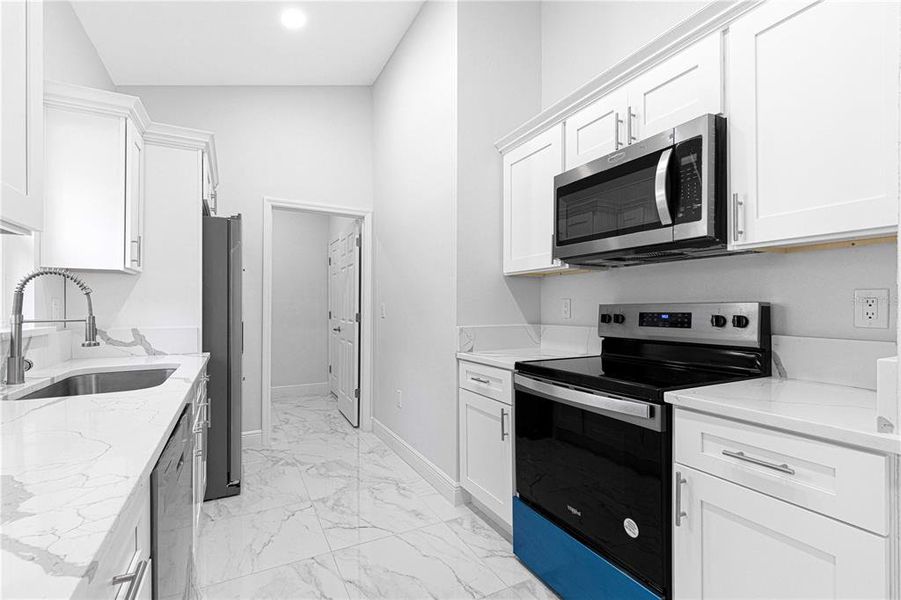 Furnished interior view inside a new home in , Summerfield (Image 5).