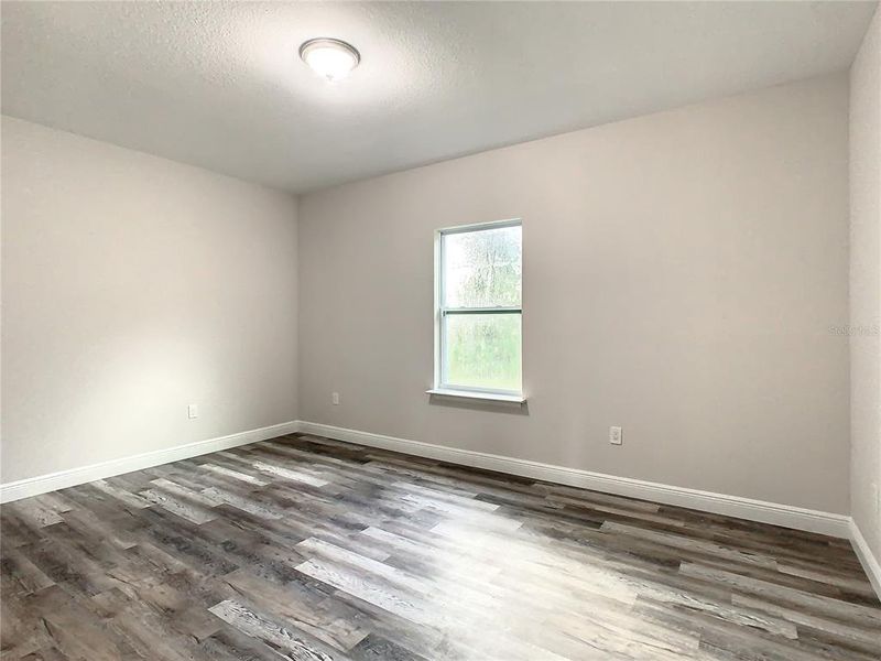 Spacious, unfurnished interior of a new home in , Port Charlotte (Image 16).