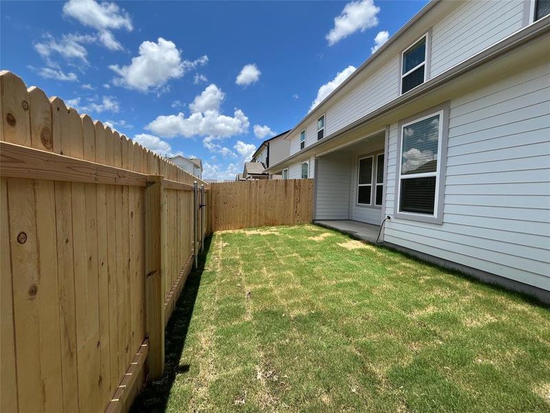Exterior details and patio area of a home in Wellspring, Round Rock (Image 2). Exterior details and patio area of a home in Wellspring, Round Rock (Image 2).