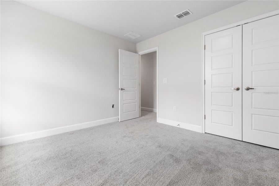 Spacious, unfurnished interior of a new home in Orange Blossom Hills, Summerfield (Image 28).