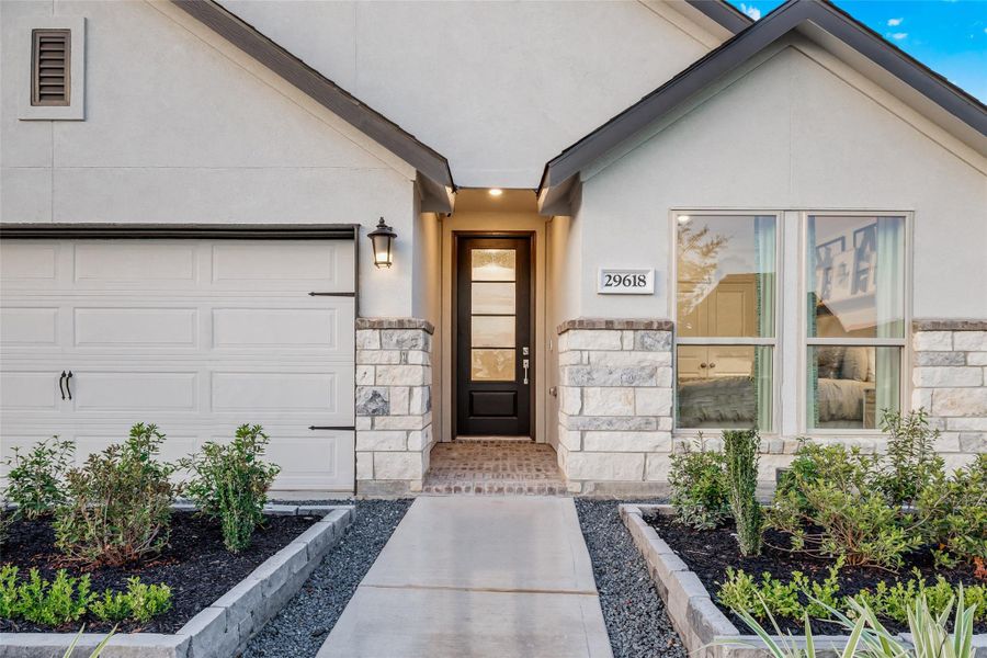 Exterior details and patio area of a home in Anniston, Katy (Image 3).