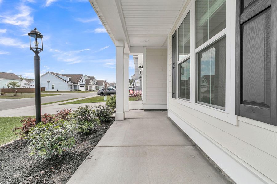 Exterior details and patio area of a home in High Point at Foxbank, Moncks Corner (Image 35).