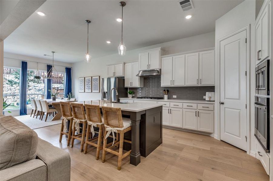 Furnished interior view inside a new home in Reunion 60s, Rhome (Image 10).