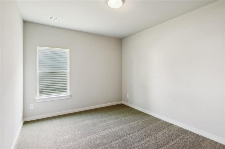 Spacious, unfurnished interior of a new home in Traditions of Braselton, Jefferson (Image 22).