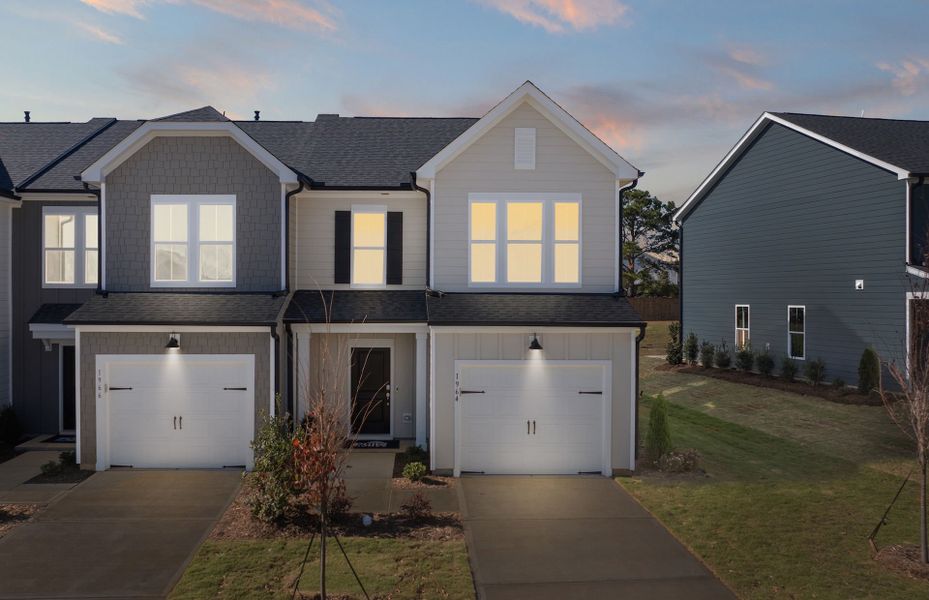 Front exterior of a new home in Saunders Farm, Willow Spring, NC, highlighting curb appeal (Image 24).