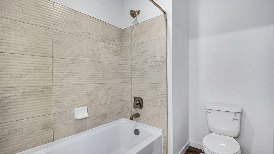 Furnished interior view inside a new home in Trails at Crowfoot, Parker (Image 18).