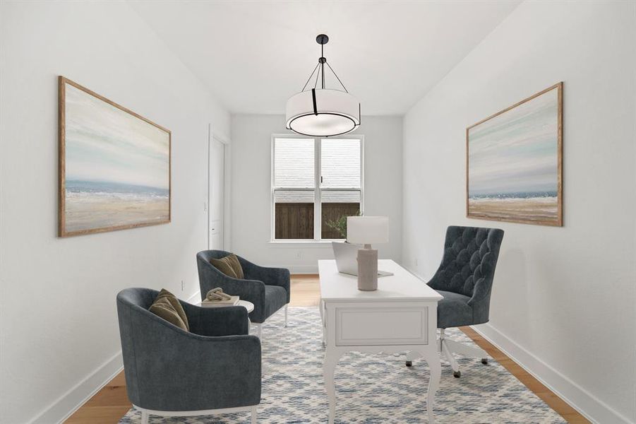 Office area featuring wood finished floors and baseboards Office area featuring wood finished floors and baseboards