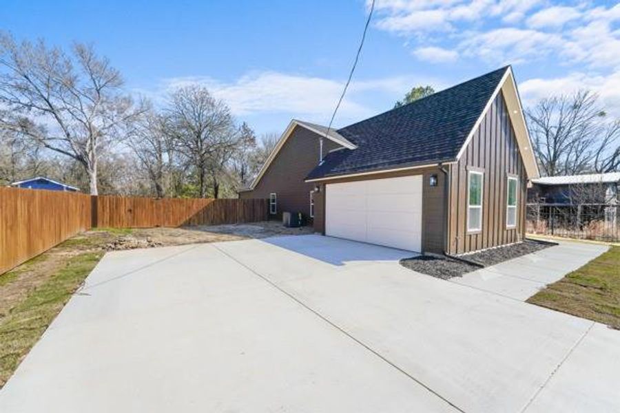 Front exterior of a new home in , Tool, TX, highlighting curb appeal (Image 26). Front exterior of a new home in , Tool, TX, highlighting curb appeal (Image 26).