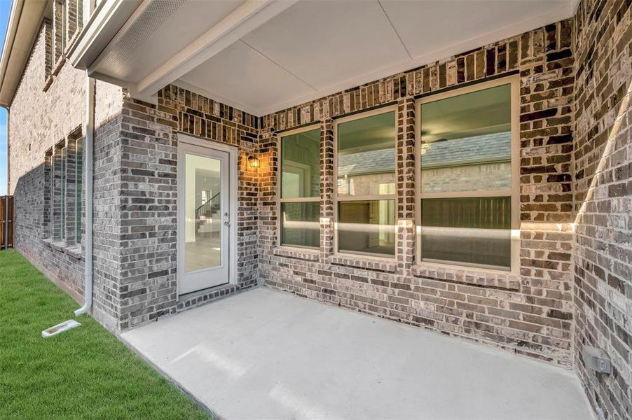 Exterior details and patio area of a home in Tarrytown, Crowley (Image 3).