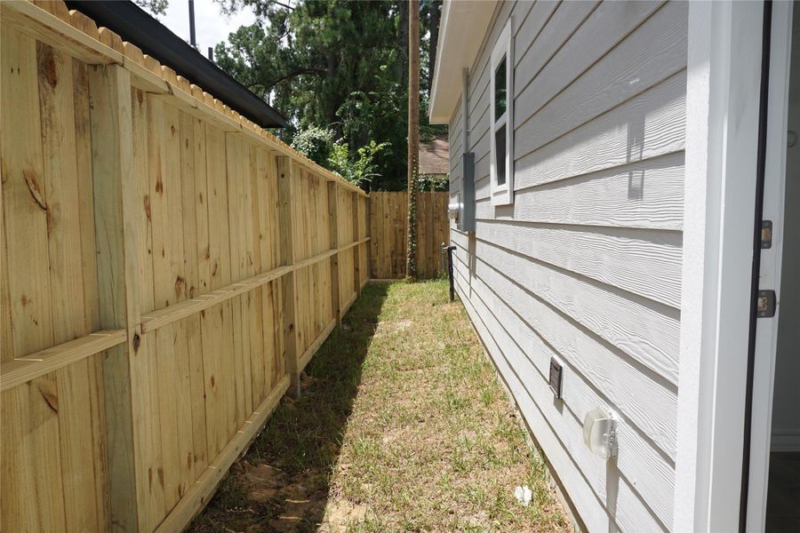 Exterior details and patio area of a home in , Willis (Image 17). Exterior details and patio area of a home in , Willis (Image 17).