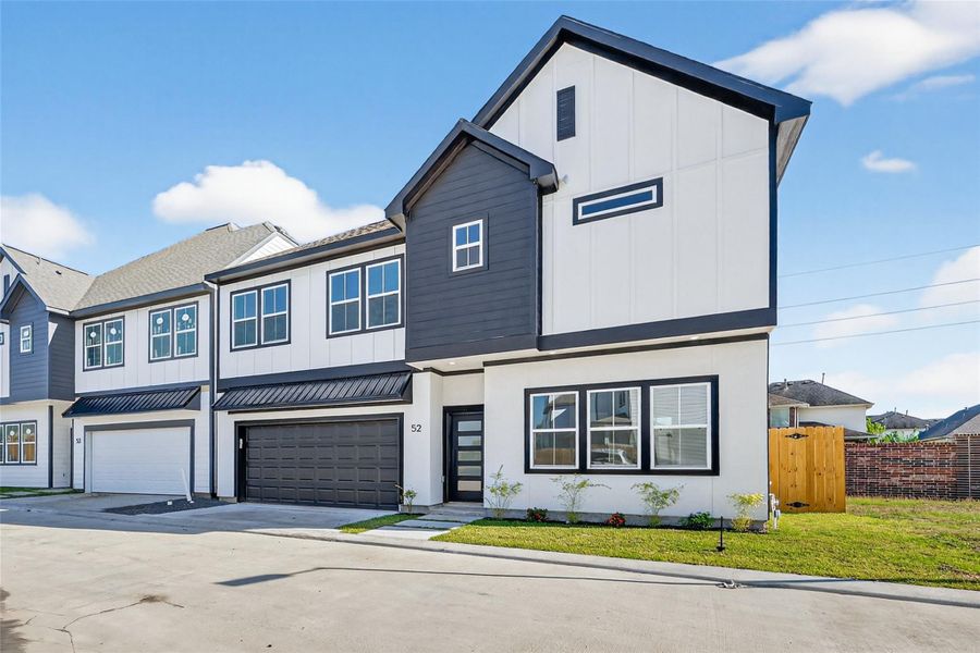 Front exterior of a new home in Metro Village, Houston, TX, highlighting curb appeal (Image 25).