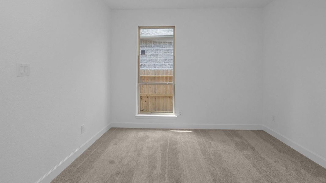 Spacious, unfurnished interior of a new home in Artavia 45', Conroe (Image 13).