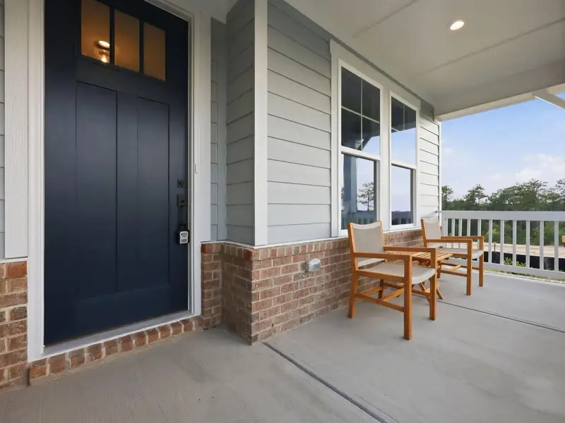Exterior details and patio area of a home in Addison West, Holly Springs (Image 2). Exterior details and patio area of a home in Addison West, Holly Springs (Image 2).