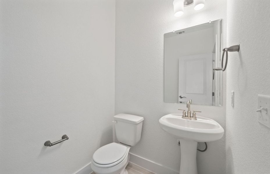 Furnished interior view inside a new home in Crosswinds, Kyle (Image 11).