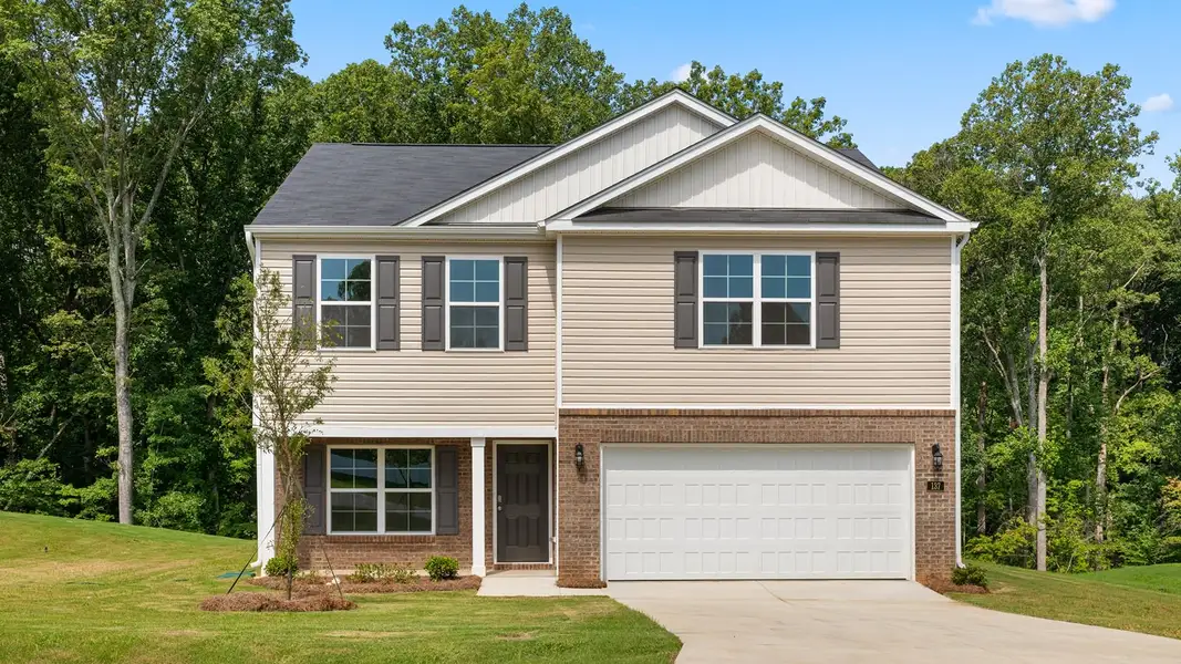 Front exterior of a new home in Fiddlers Landing, Winston-Salem, NC, highlighting curb appeal (Image 1). Front exterior of a new home in Fiddlers Landing, Winston-Salem, NC, highlighting curb appeal (Image 1).