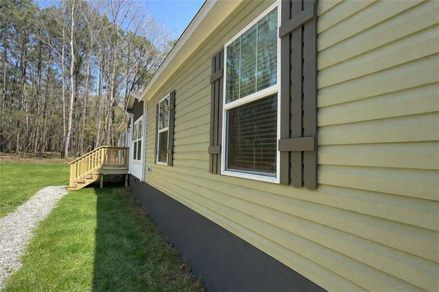 Exterior details and patio area of a home in , Eatonton (Image 26).