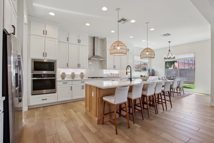 Kitchen - model home. Finishes and options may vary by community