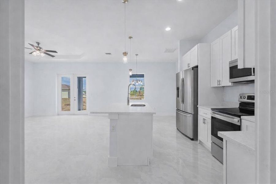 Furnished interior view inside a new home in , Lehigh Acres (Image 5). Furnished interior view inside a new home in , Lehigh Acres (Image 5).