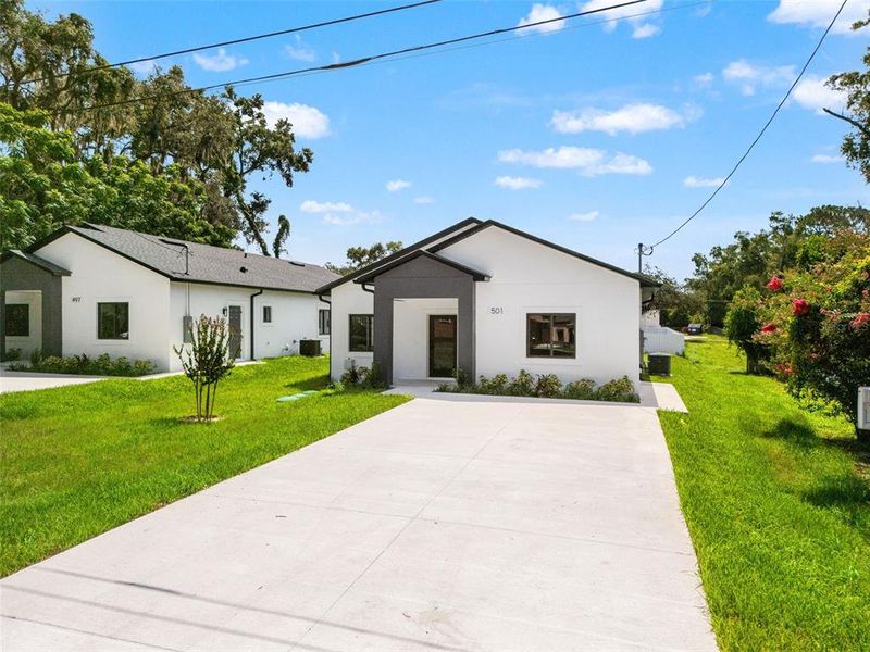 Front exterior of a new home in , Apopka, FL, highlighting curb appeal (Image 1). Front exterior of a new home in , Apopka, FL, highlighting curb appeal (Image 1).