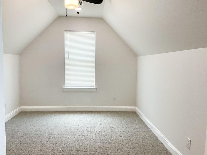 Upstairs bonus room with closet. Upstairs bonus room with closet.
