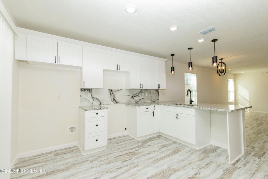 Furnished interior view inside a new home in , Jacksonville (Image 2). Furnished interior view inside a new home in , Jacksonville (Image 2).