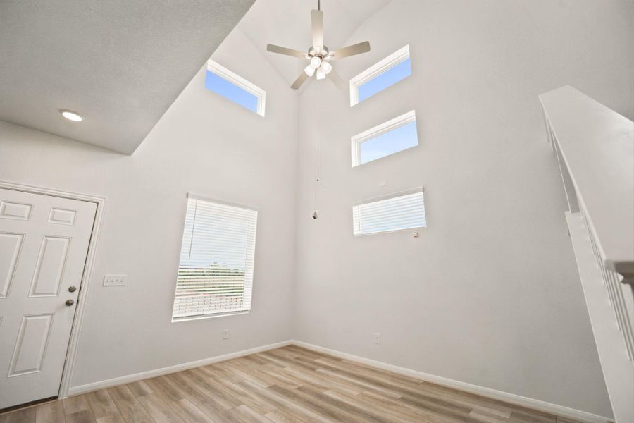 Soaring vaulted ceilings and stacked windows create a dramatic architectural entrance.
