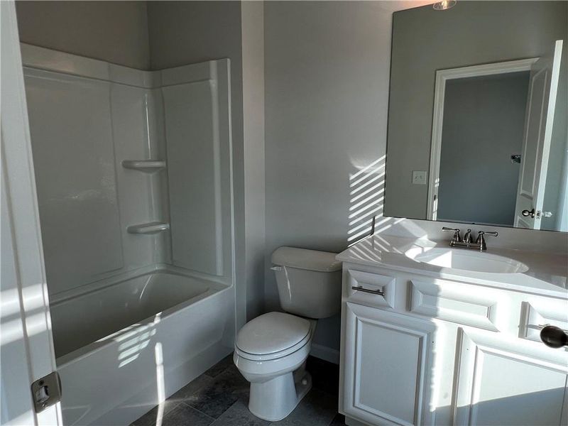 Furnished interior in a model home at The Village at Maple Street in Dawsonville (Image 6).