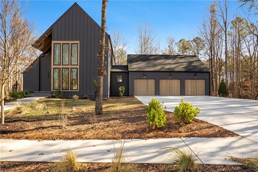 Front exterior of a new home in Aster, Roswell, GA, highlighting curb appeal (Image 24).