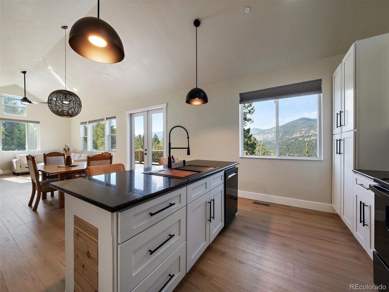 Also featuring new stainless steel appliances and a large farmhouse sink.