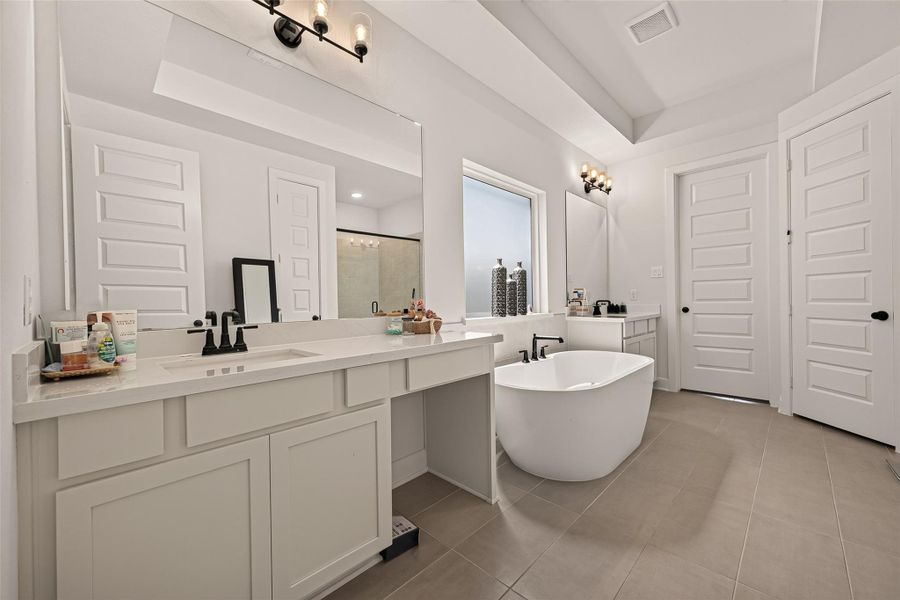 The oversized vanity provides abundant storage and countertop space. The oversized vanity provides abundant storage and countertop space.