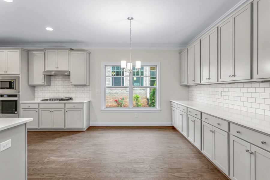 Representative furnished interior of a home built from the Ellington by Keystone Homes NC in Weybridge, Burlington (Image 19).