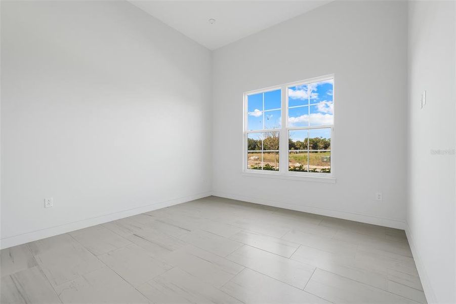 Spacious, unfurnished interior of a new home in Hampton Green at Providence, Davenport (Image 36).