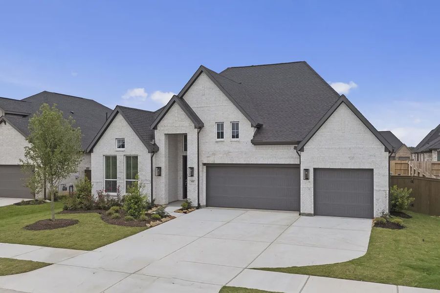 Front exterior of a new home in Attwater 65's, Waller, TX, highlighting curb appeal (Image 21).