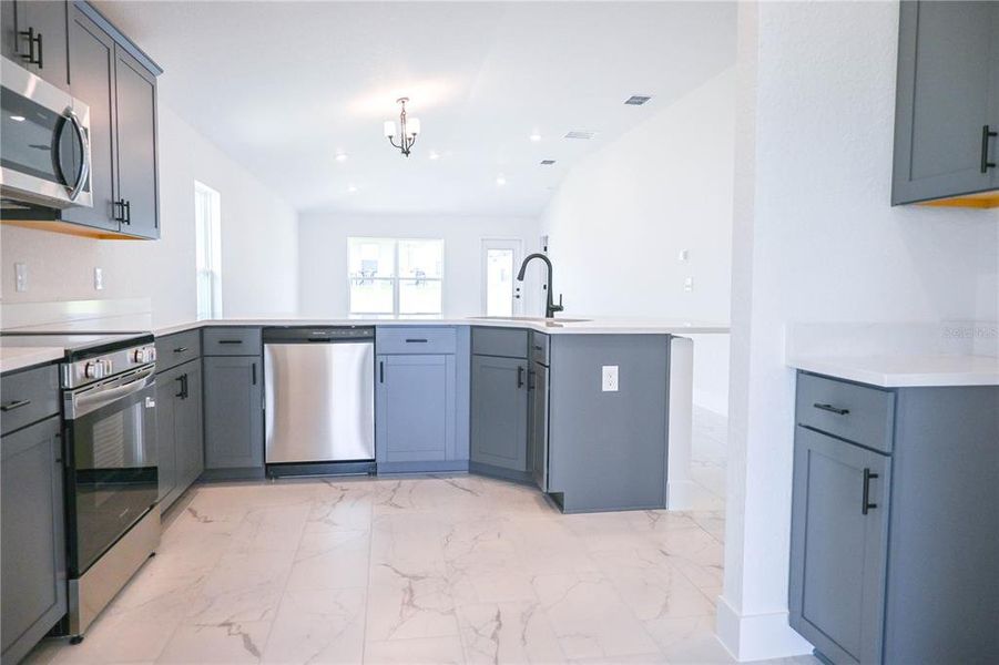 Furnished interior view inside a new home in , Ocala (Image 3).