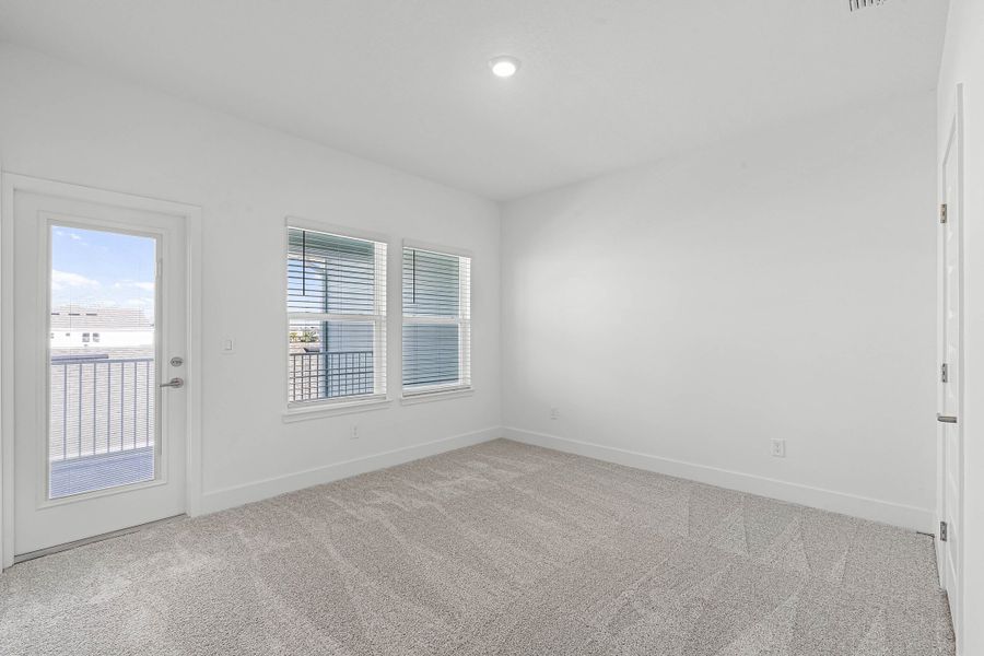Spacious, unfurnished interior of a new home in Harvest at Ovation - Townhomes, Winter Garden (Image 23).