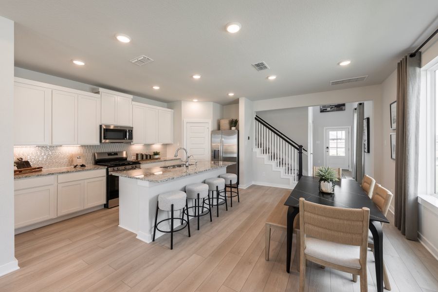 Furnished interior view inside a new home in Mason Woods, Cypress (Image 5).