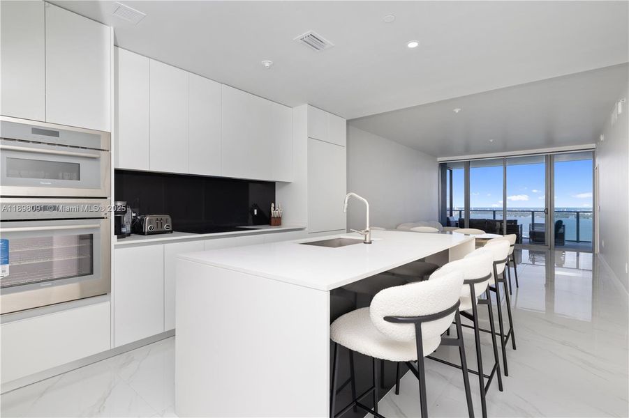 Furnished interior view inside a new home in , Miami (Image 7). Furnished interior view inside a new home in , Miami (Image 7).