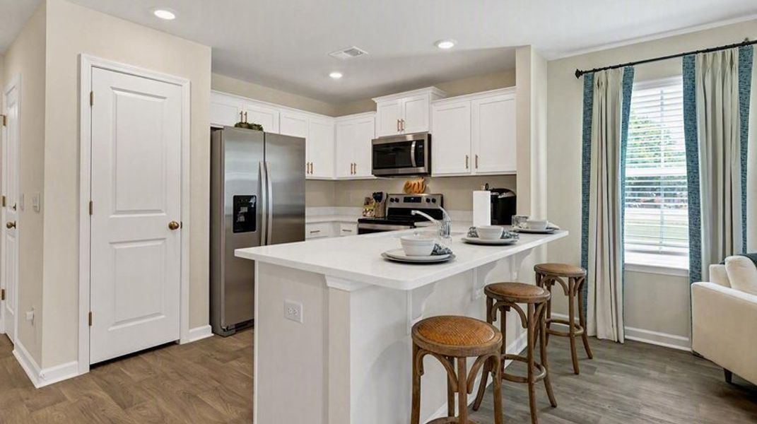 Furnished interior view inside a new home in Hunter's Branch Townhomes, Hopkins (Image 8).