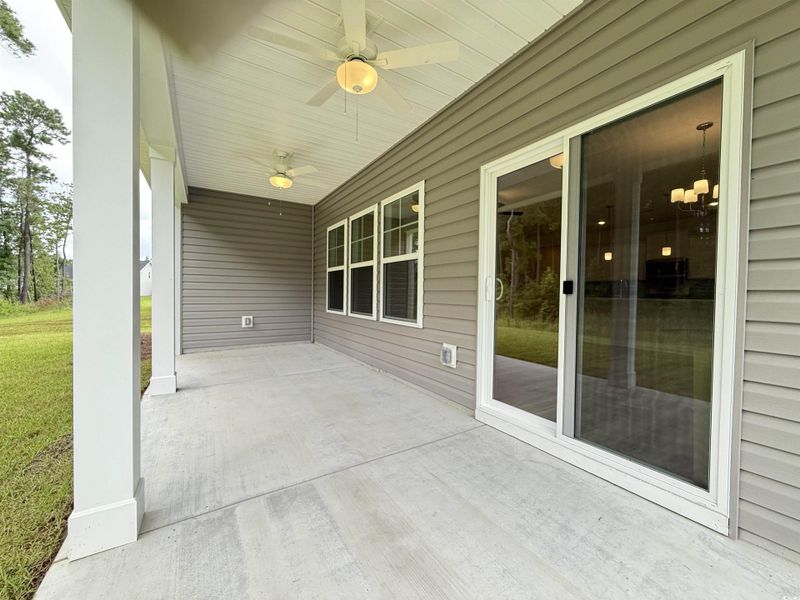 Exterior details and patio area of a home in Beach Gardens, Conway (Image 16). Exterior details and patio area of a home in Beach Gardens, Conway (Image 16).