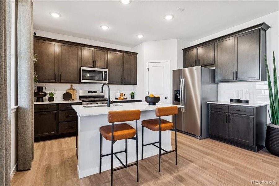 Furnished interior view inside a new home in Sweetgrass, Dacono (Image 15).