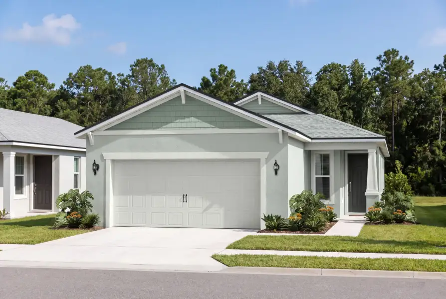 Representative exterior photo of a completed home built from the Flagstone by Del Webb in Del Webb Flagler Beach, Palm Coast, FL (Image 19). Representative exterior photo of a completed home built from the Flagstone by Del Webb in Del Webb Flagler Beach, Palm Coast, FL (Image 19).