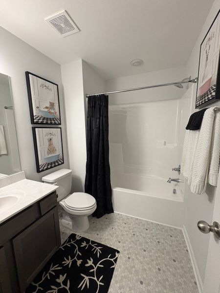 Photo is of the model home to show what the completed floor plan looks like. Selections and Options may vary.