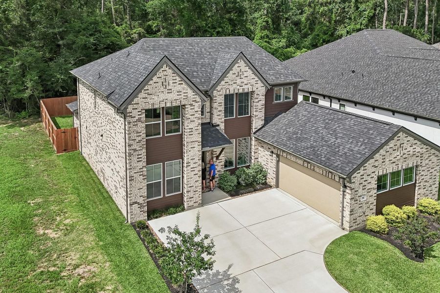Front exterior of a new home in , Montgomery, TX, highlighting curb appeal (Image 29). Front exterior of a new home in , Montgomery, TX, highlighting curb appeal (Image 29).