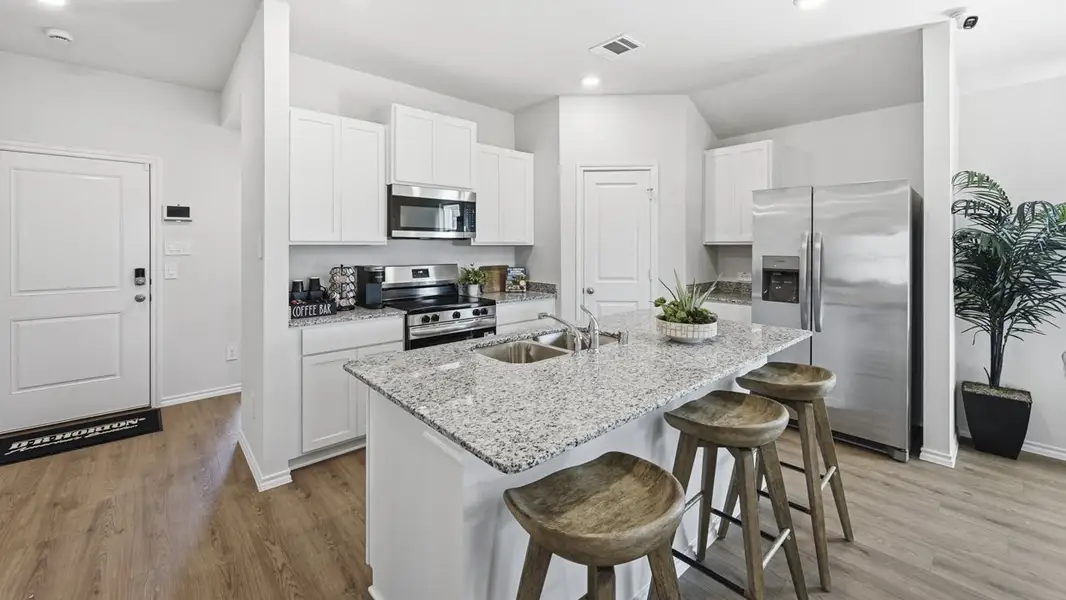 Representative furnished interior of a home built from the Elgin by D.R. Horton in Bel Air Village, Sherman (Image 7).