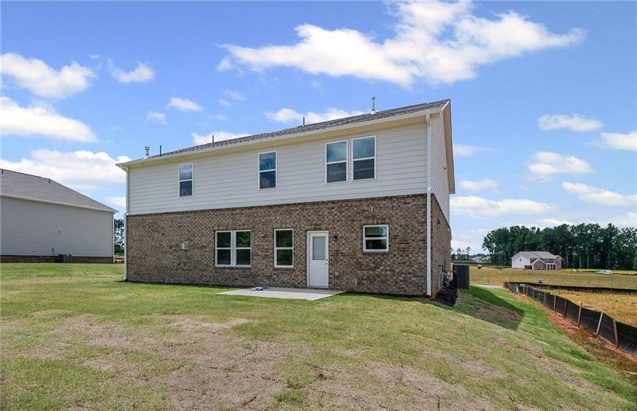 Front exterior of a new home in Anderson Point Estates, McDonough, GA, highlighting curb appeal (Image 21).