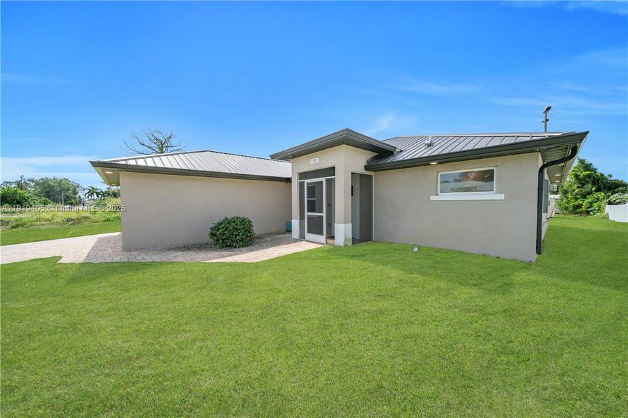 Exterior details and patio area of a home in , Lehigh Acres (Image 22). Exterior details and patio area of a home in , Lehigh Acres (Image 22).